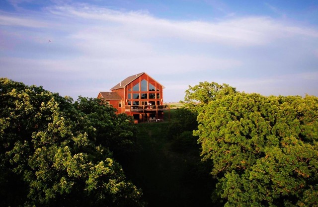 Cabin on the Big Sioux River with a 100 acre wood.