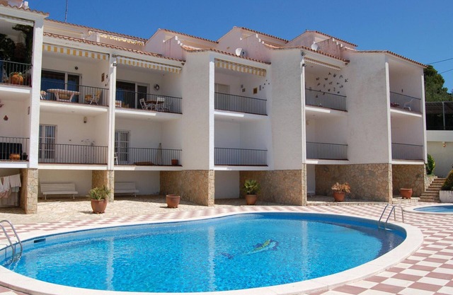 CABIONI - casa adosada con piscina comunitaria, cerca de la playa de Grifeu.