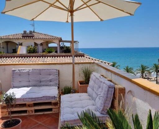 Cal SalMaré seafront apartment with rooftop terrace and pool