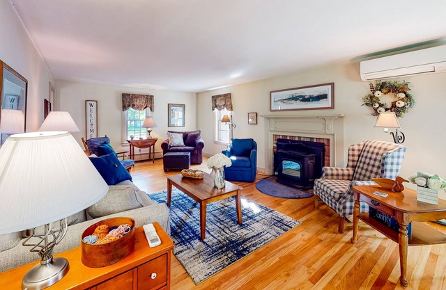 Calming home with private yard, deck, grill, firepit, rec room & updated kitchen