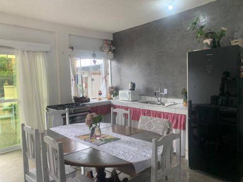 Casa a 6min da praia e do Shopping