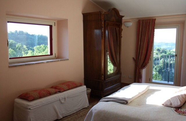 CASA AMOROSA is A HOUSE ON THREE FLOORS WITH A HABITABLE CELLAR AND TWO TERRACES.