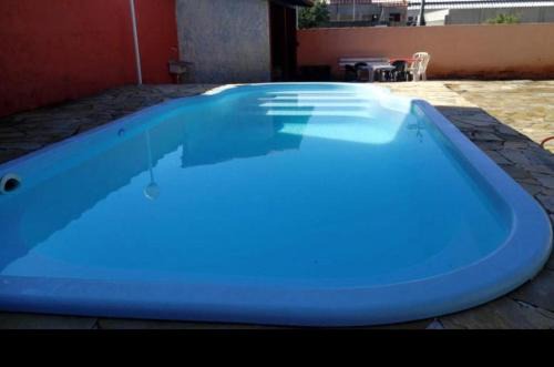 Casa ampla a 100 passos do mar, piscina, churrasqueira, salão de jogos