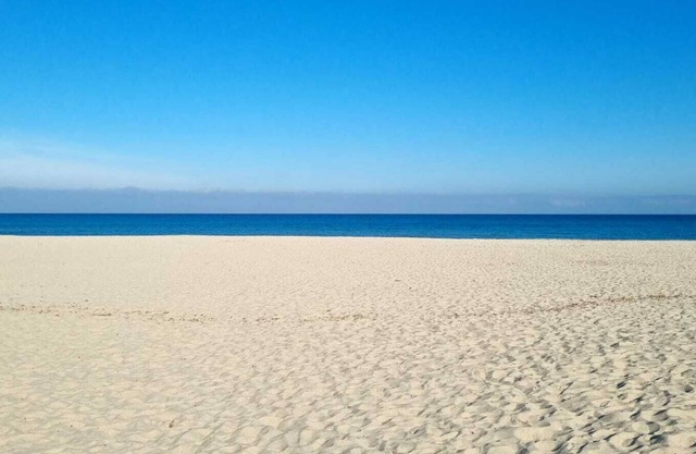 Casa Budoni cozy apartment centrally but quietly located.1km from the beach!
