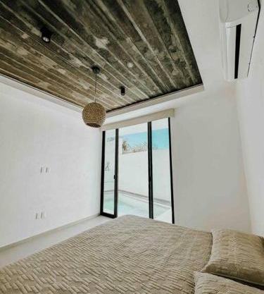 Casa Calec: Dpto A. nuevo con piscina