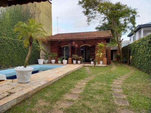 Casa com piscina a 300mts do mar