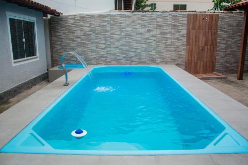 Casa com piscina Costa Azul