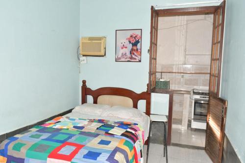 Casa com Quarto Duplo com Banheiro Privativo