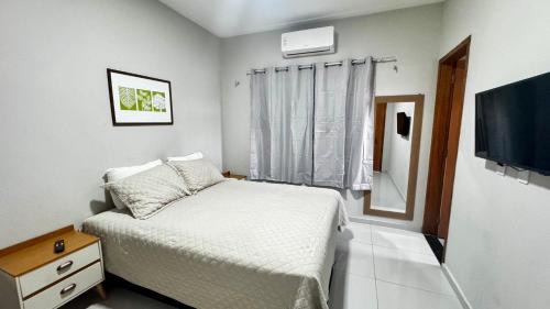 Casa confortável com ar no litoral