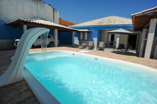 Casa confortavel com WiFi, piscina e churrasqueira