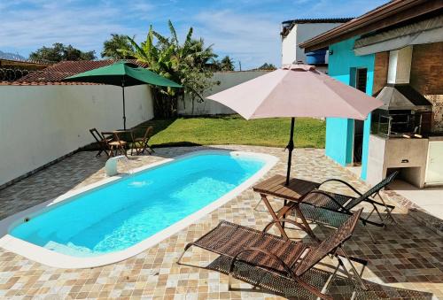 Casa de Praia em Bertioga, São Paulocom Piscina Ar Condicionado Wifi a 500m do Mar