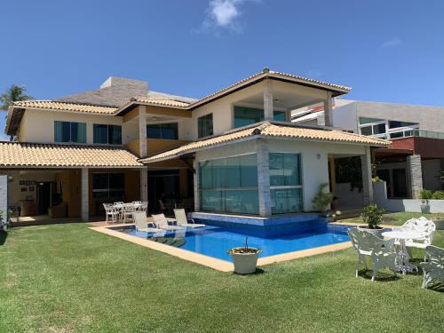 Casa em condominio beira Rio