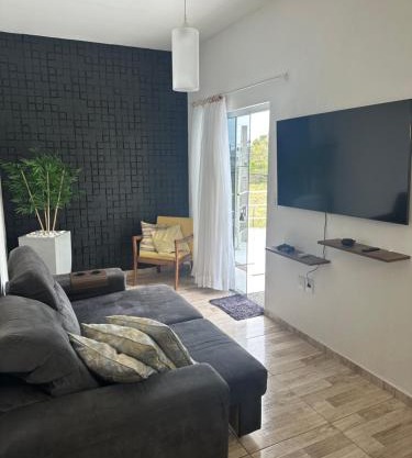 Casa em Florianópolis no bairro de Canasvieiras com sacada e churrasqueira!
