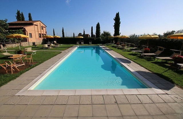 Casa Flora D: A characteristic and welcoming two-story apartment that is part of a villa surrounded by the greenery, with Free WI-FI.