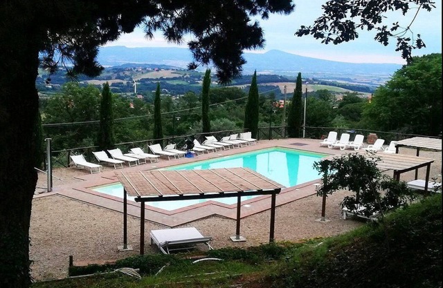 Casa Nocetta E: A characteristic and welcoming apartment that is part of an ancient country house surrounded by the greenery, with Free WI-FI.