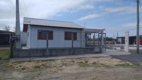 Casa pé na areia