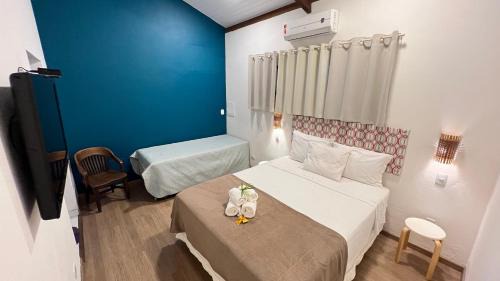 Casa Tiê - Passarim Hospedagem