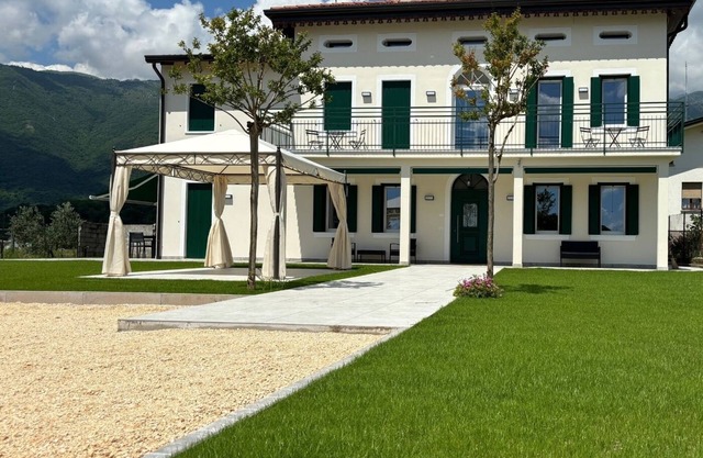 Casa Titti Polcenigo entire housing with a view of Friulian hills.