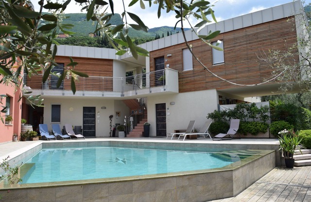 "CASABANA "App.GIRASOLE with private garden -top pool 023045-LOC-00051