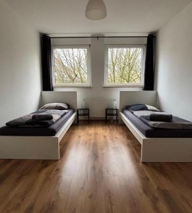 Case Four Boardinghouse mit Parkplatz, Küche, Waschmaschine und Trockner