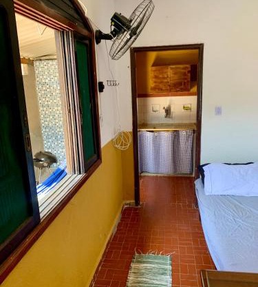 Casinha 4 quadras da praia com churrasqueira e garagem