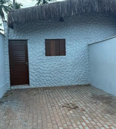 casinha na rua da praia