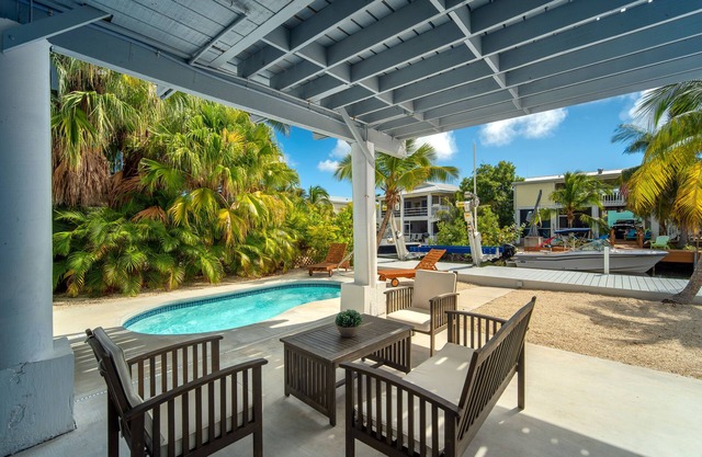 Cayman Retreat | Cozy coastal pool home with boating on Ramrod Key