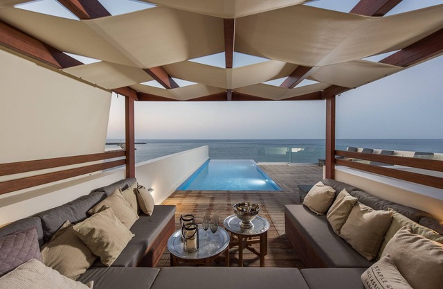 CELESTINE, beach front villa with roof top pool and spectacular views.