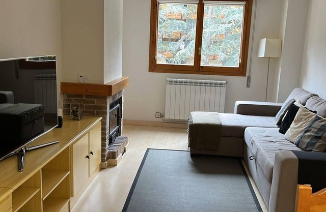 Central Apartment in Jaca with Pool, Terrace, and Covered Parking