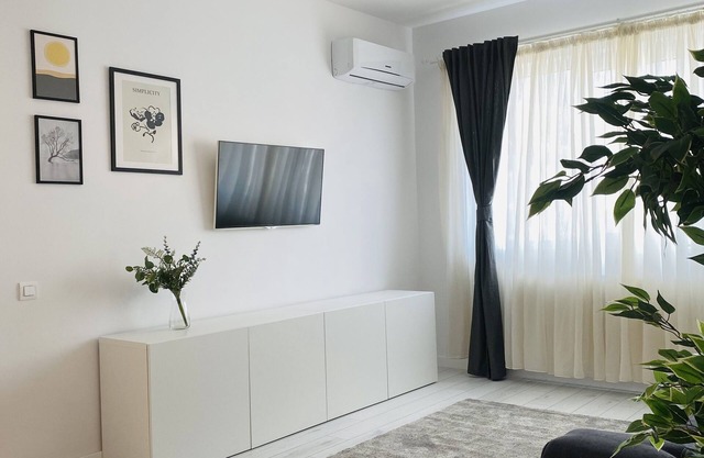 Central cozy apartment with free private parking space.