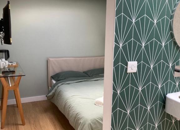 Central ensuite guest unit with air conditioning and free on street parking