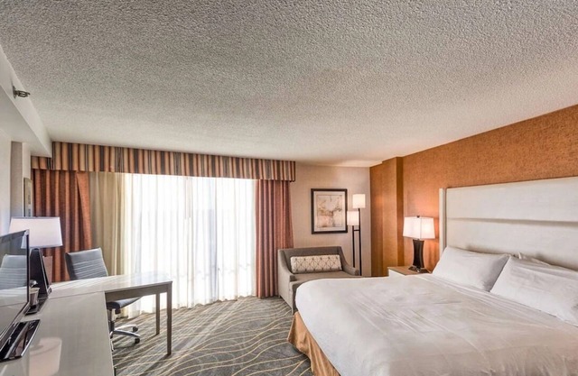 Central Location: Free Airport Shuttle and Free Parking | Indoor Swimming Pool