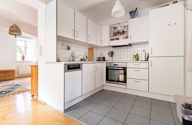 Central, quiet oasis with garden and parking lot