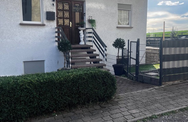 Centrally located top floor apartment with pool view, air conditioning and fitness equipment