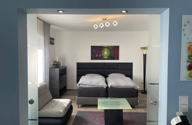 Centrally located in Leverkusen, modern furnished chic city apartment with service