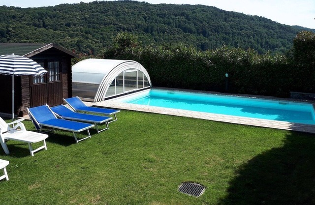 Chalet Dania with garden, pool and lake view