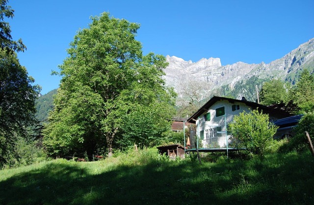 Chalet on the edge of the forest with a view of the waterfall right next door