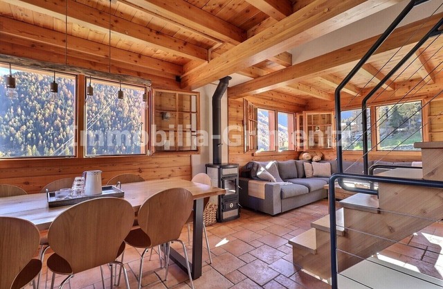 Chalet ski in - ski out on 3 levels for 8 people, living room with wood-burner, kitchen area with di