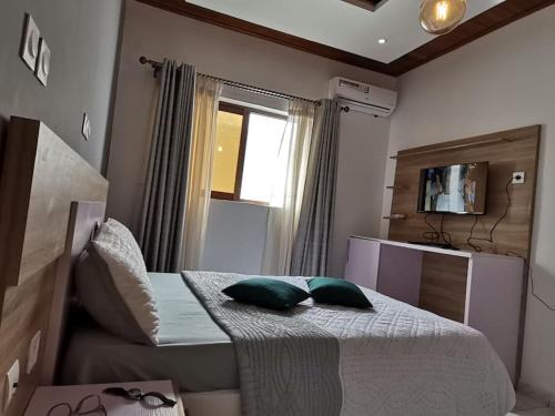 Chambre de luxe chez FOUR IN ONE Résidence
