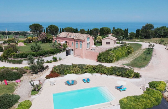 Charm and hospitality at 500 meters from the sea. Pool surrounded by greenery