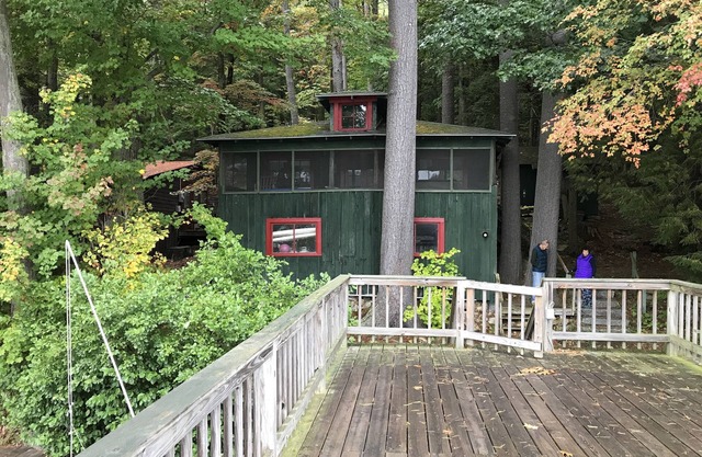 Charming 1920's cottage on Lake George w/boat slip & sundeck.