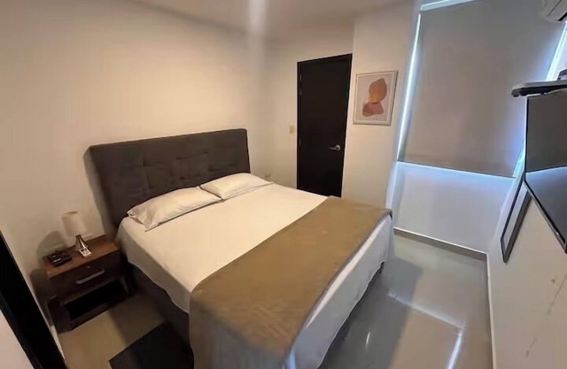 Charming 2-bedroom apartment in welcoming Barranquilla with fitness room, AC