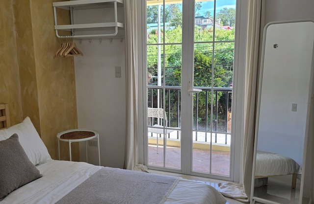 Charming 2-bedroom condo in cool Baguio with WiFi and access to fitness room