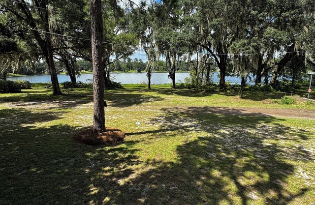 Charming 2-bedroom lake front cottage in lovely Lake Park Georgia.