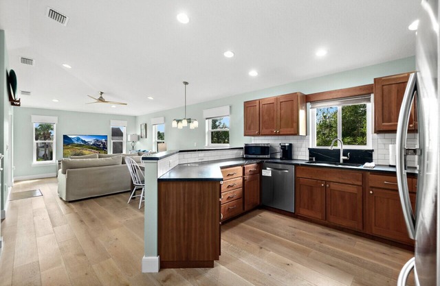 Charming 3-Bed 2.5-Bath Secluded Oasis Just 1 Block from the Beach + Open-Air & Screened Deck