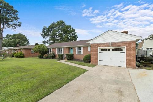 Charming 3-Bed Brick Home with Sunroom & Fireplace