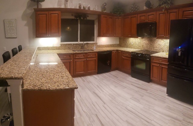 Charming 3-bedroom house with WiFi and fitness room in OrlandonGated community
