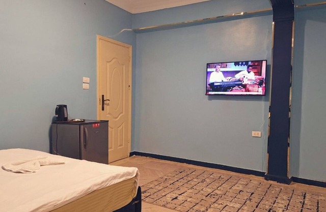 Charming 9-bedroom hotel with AC, WiFi in peaceful Giza Governorate