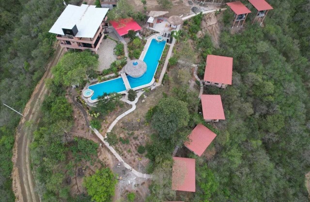 Charming boutique resort in pleasant Puerto Lopez with WiFi, fitness room, AC