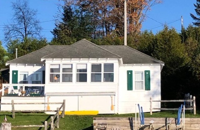 Charming cottage on Lake Willoughby w/sun porch, private deck and dock.